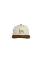 Cap with 'la' logo