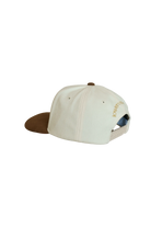 Beige cap with brown visor 