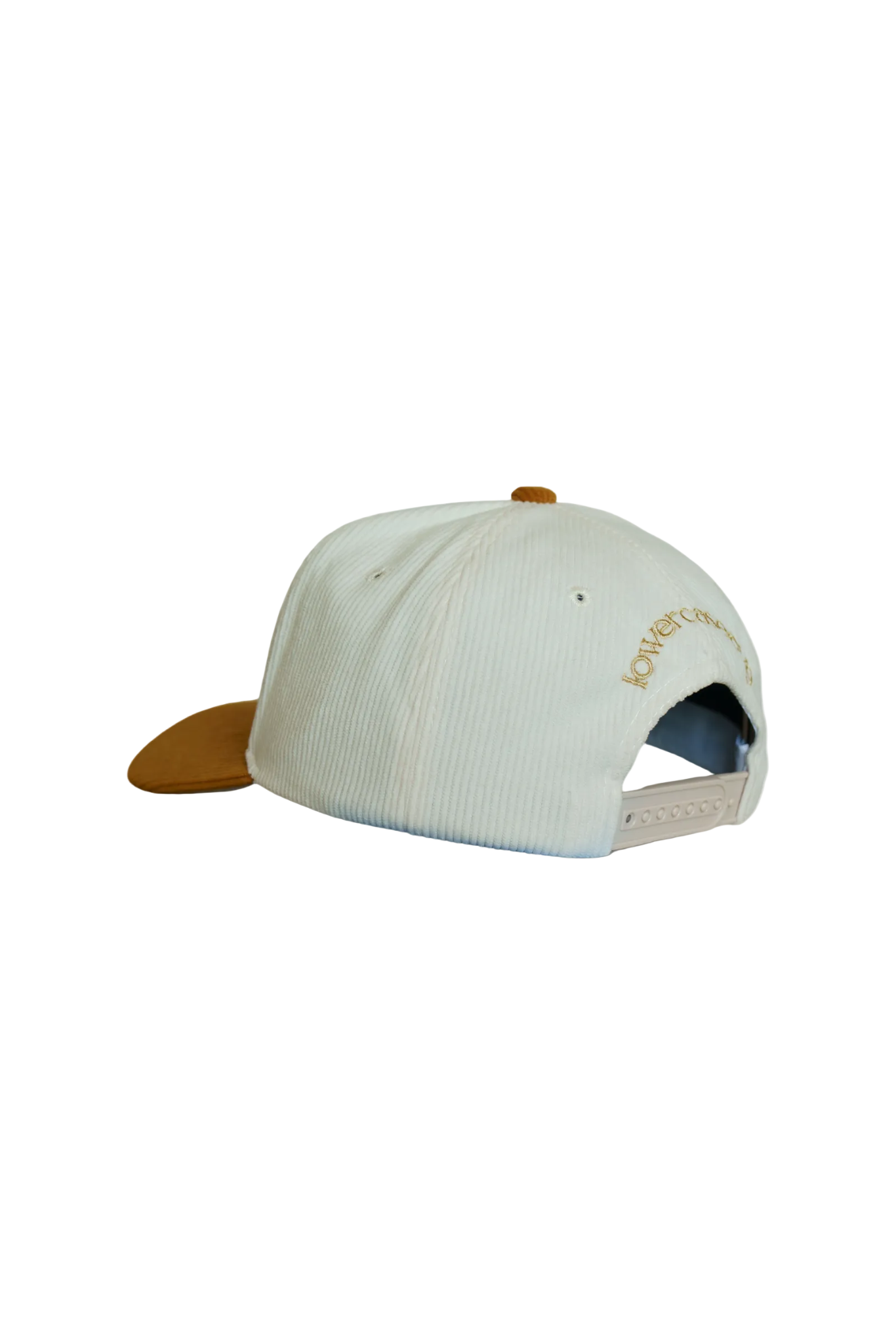 White cap with ochre visor on a white background