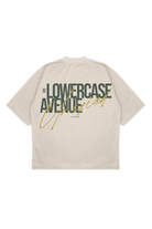 Beige t-shirt with 'LOWERCASE AVENUE' text on a white background