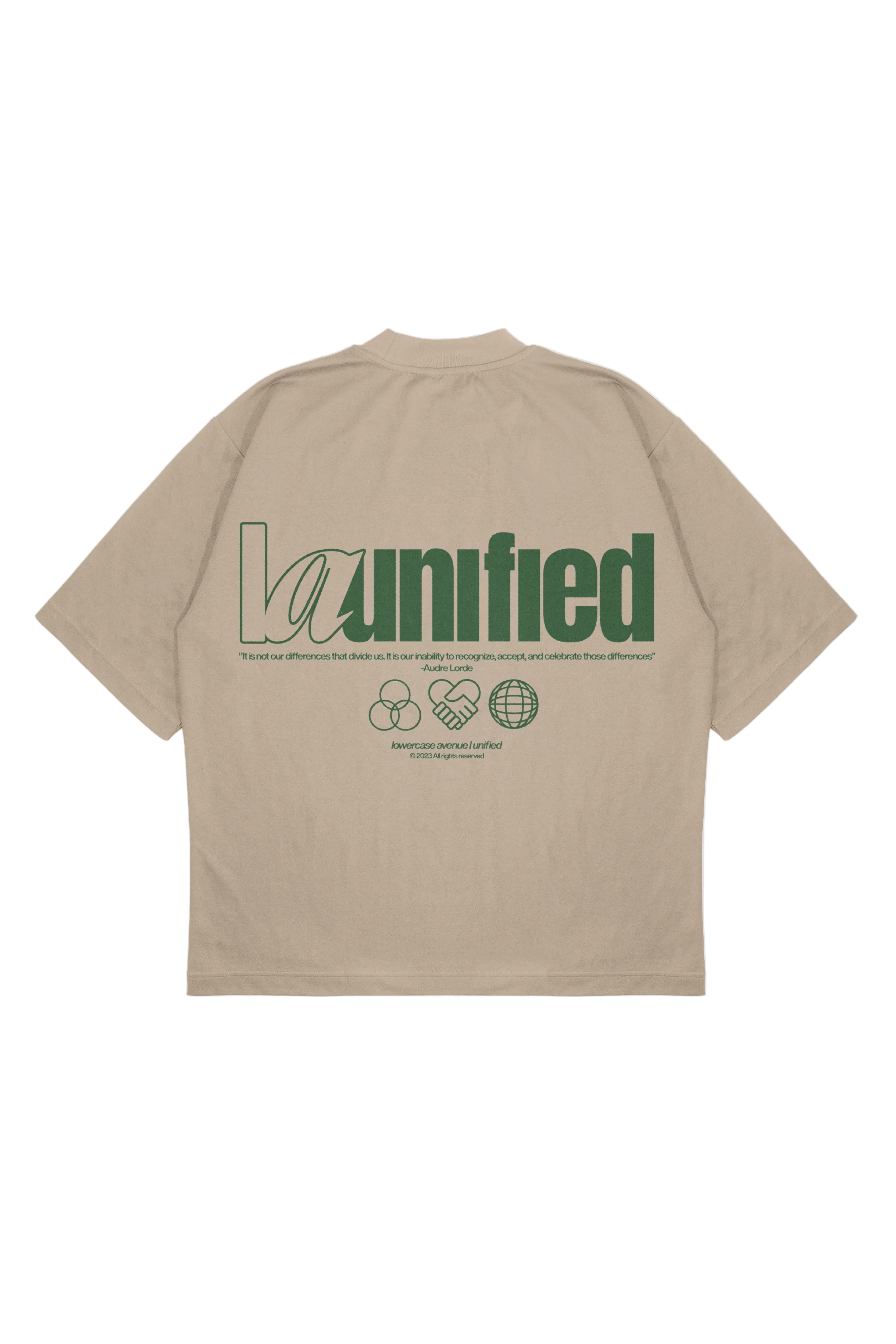 Beige t-shirt with green text and graphics